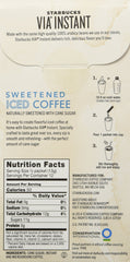Starbucks VIA iced coffee poured into glass over ice showcasing ready-to-drink refreshment