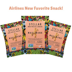 Stellar Snacks mini pretzel in hand showing travel-ready portion convenience