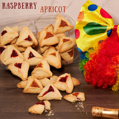 Raspberry-filled Stern's Bakery hamentaschen showing vibrant fruit filling