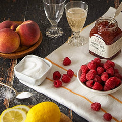 Stonewall Kitchen spoon with jam close-up displaying chunky fruit texture