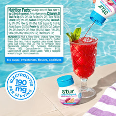 Stur liquid drop mixing into water, showing instant flavor infusion