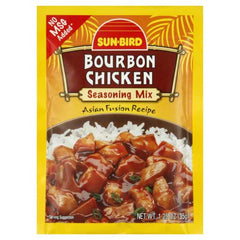Sunbird close-up of seasoning brushed onto cooked chicken creating glossy, flavorful glaze
