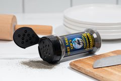 Sure Shot Sid's 12 oz bottle next to a ruler showing package size benefit