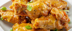 Sweet Baby Ray's close-up texture highlighting glossy citrus-pepper glaze