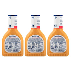Sweet Baby Ray's sauce pouring close-up showing creamy texture and horseradish specks