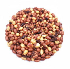 SweetGlob close-up of red skin peanuts and chili specks highlighting crunchy texture