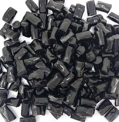 SweetGourmet close-up of soft black licorice bites highlighting chewy texture benefit
