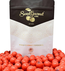 SweetGourmet gumballs dispensing from vending machine showing reliable fit