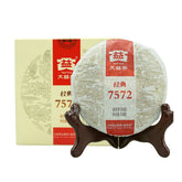 TAETEA front packaging showing tea cake and brand trust benefits