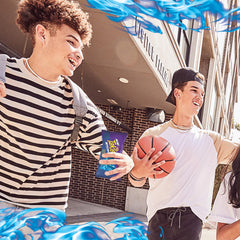 Takis Blue Heat pouch in hand displaying single-serve size and easy carrying