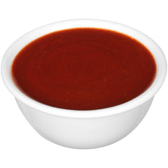 Tapatio packet being squeezed onto a taco adding spicy, balanced flavor