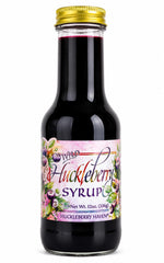 Taste the Wilderness front bottle view showing label and 12oz size benefit