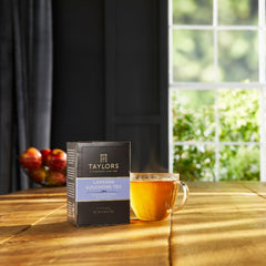 Taylors of Harrogate close-up of tagless tea bag and smoked leaf texture, highlights rich aroma