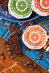 Taza Chocolate assortment of eight discs arranged to show each distinct flavor