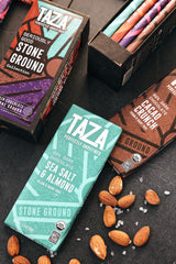 Taza Chocolate four bars fanned to display included flavors and variety benefits