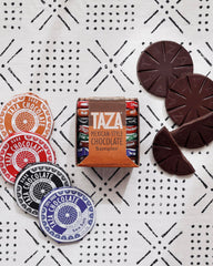 Taza Chocolate disc melting into cup to make hot chocolate with bold rustic texture