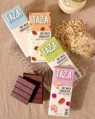 Taza Chocolate oat milk bars displayed on table in a gift setting highlighting vegan, dairy-free appeal