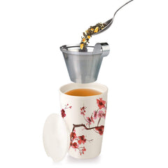 Tea Forte brewed cup of Earl Grey demonstrating clear amber color and serving suggestion