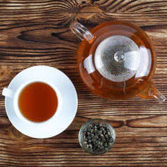 Tealyra cup of brewed jasmine green tea offering calming aroma
