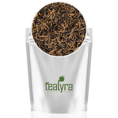 Tealyra loose leaves beside a scale showing 220g portion accuracy