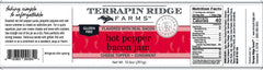 terrapin ridge spoon scooping jam from open jar for serving