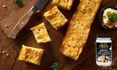 TETA FOODS toum spread on pita demonstrating creamy, even coverage