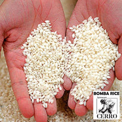THE BLACK HOOF paella in pan using bomba rice delivering separate, flavorful grains