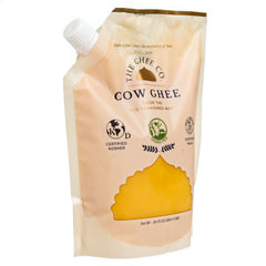 The Ghee Co. spoon scooping ghee to demonstrate ease of use and cooking convenience