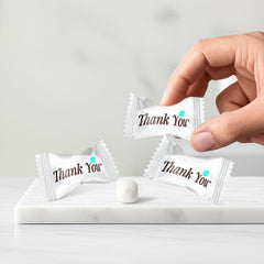 THE HAMPTON CANDY COMPANY mint in hand showing true size and convenient portioning