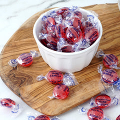 THE HAMPTON CANDY COMPANY bowl of individually wrapped discs ideal for sharing and display benefit