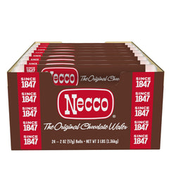 Close-up of chocolate Necco wafers stacked in a roll showing texture and biteable layers
