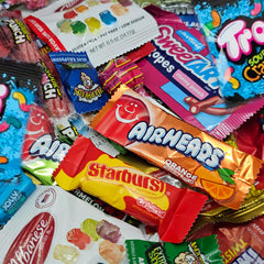 Close-up of individually wrapped candies showing brand variety and freshness from The LakeHouse