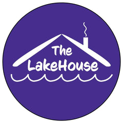 Hand holding The LakeHouse pack next to a ruler to show 32 oz scale for portion planning