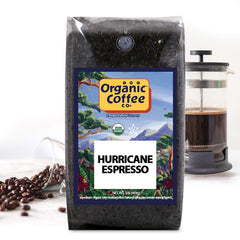 Pulling an espresso shot made with The Organic Coffee Co. Hurricane Espresso showcasing crema