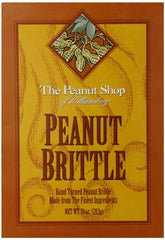 Brittle pieces arranged on a wooden board from The Peanut Shop of Williamsburg, ideal for sharing at gatherings