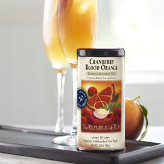 The Republic of Tea brewed iced Cranberry Blood Orange Black Tea in a glass with ice highlighting refreshing citrus flavor
