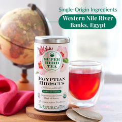 Pouring iced The Republic of Tea hibiscus over glass with ice, refreshing cold-brew benefit
