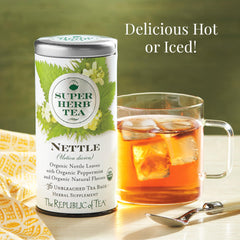Pouring brewed nettle tea into a cup, The Republic of Tea emphasizing clear color and clean taste