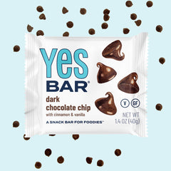 The YES Bar ingredient spread with nuts seeds and maple syrup showing wholesome ingredients