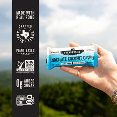 Thunderbird Real Food Bar unwrapped in hand illustrating portability and convenience