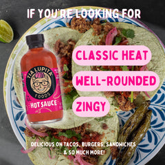 TIA LUPITA sauce drizzled over tacos adding balanced heat and flavor