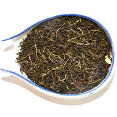 TIAN HU SHAN brewed cup top view showing clear liquor and floral aroma