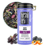 Tiesta Tea tin front view showing Grape Escape label and bright packaging benefit: clear identification