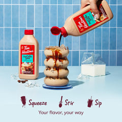 Tim Hortons 16oz bottle beside cup to show scale and portion-friendly size