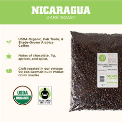 Tiny Footprint Coffee roaster action shot showing small-batch craft and quality control