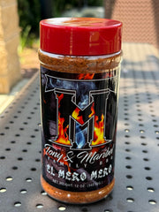Tony and Maribel seasoning in a backyard grill scene demonstrating bold flavor for gatherings