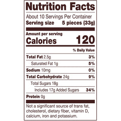 Tootsie Roll bag held in hand to show 11.5 oz scale, helps understand portion size