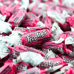 Cross section of a Frootie showing chewy texture and fruit-flavored interior