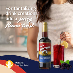 Torani blackberry syrup being poured into iced tea demonstrating quick dissolve and flavor boost