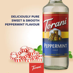 Close-up pour of Torani peppermint syrup into cup, precise dosing benefit